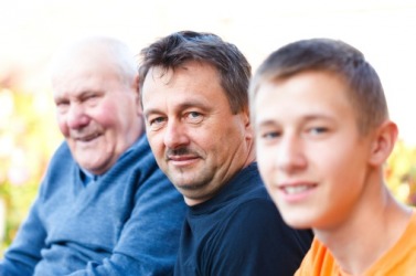 The physical heritage of having the same forehead and hairline is shared by the grandfather, father and son. The physical heritage of having the same forehead and hairline is shared by the grandfather, father and son.