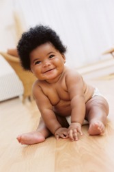 A happy, plump baby. A happy, plump baby.