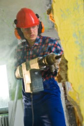 Man using pneumatic drill Man using pneumatic drill