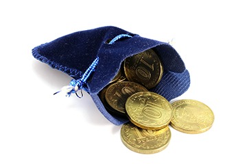 A pouch full of coins. A pouch full of coins.