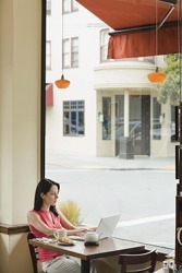 A seat by the window is preferable to her when she is working on her computer. A seat by the window is preferable to her when she is working on her computer.