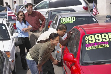 A family shopping for a car. A family shopping for a car.