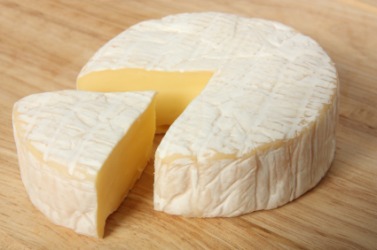 The rind of this cheese, having a powdery coating, is said to be bloomy. The rind of this cheese, having a powdery coating, is said to be bloomy.