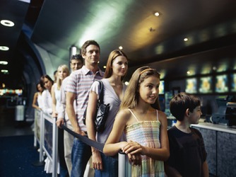 The family's primacy at the premier of the popular movie guarantees that they will get to sit together. The family's primacy at the premier of the popular movie guarantees that they will get to sit together.
