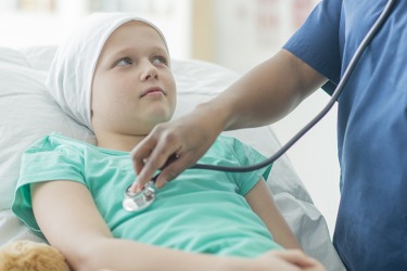 A young patient getting an exam. A young patient getting an exam.