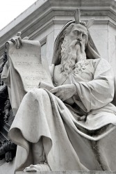 A statue of Moses holding the Ten Commandments. A statue of Moses holding the Ten Commandments.