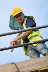 This bricklayer is considered a blue-collar worker. This bricklayer is considered a blue-collar worker.