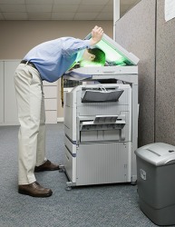 Andy is up to his usual puerile behavior by making a photocopy of his face. Andy is up to his usual puerile behavior by making a photocopy of his face.