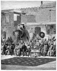 A rajah sitting on a throne in a ceremonial gathering under British rule. A rajah sitting on a throne in a ceremonial gathering under British rule.
