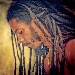 The Rastafarian does not cut his hair because that is part of his belief. The Rastafarian does not cut his hair because that is part of his belief.