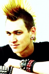 The young man was perceived as a rebel because of his hairstyle and piercings. The young man was perceived as a rebel because of his hairstyle and piercings.