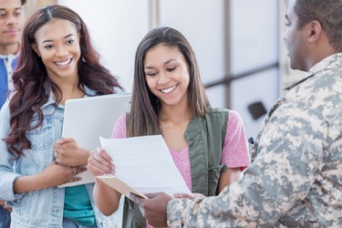 The recruitment of military servicemen and servicewomen is often conducted at high schools. The recruitment of military servicemen and servicewomen is often conducted at high schools.