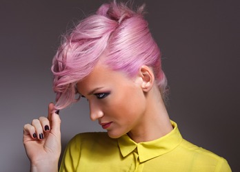 The 1980's neon hair redux, a la Cindy Lauper, has become fashionable again. The 1980's neon hair redux, a la Cindy Lauper, has become fashionable again.