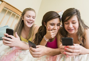 Teenage girls are fluent in the parlance of texting lingo. Teenage girls are fluent in the parlance of texting lingo.