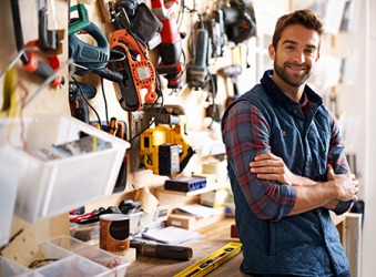 Paul has a lot of tools because he owns a business building custom furniture. Paul has a lot of tools because he owns a business building custom furniture.