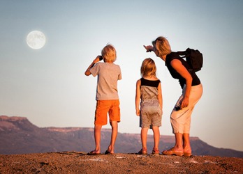 Michelle pointed out the rising moon to her children while on a hike in the canyon. Michelle pointed out the rising moon to her children while on a hike in the canyon.