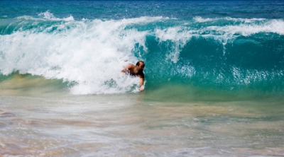 A man bodysurfing. A man bodysurfing.
