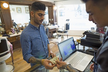 Tristan used cash to remunerate the owner of the barbershop for his haircut. Tristan used cash to remunerate the owner of the barbershop for his haircut.