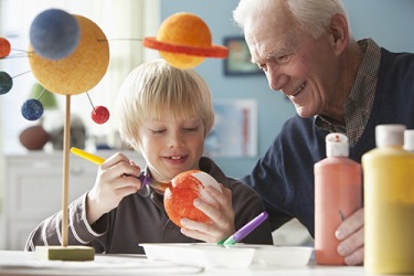 Andrew and his grandfather are creating a replica of the solar system. Andrew and his grandfather are creating a replica of the solar system.