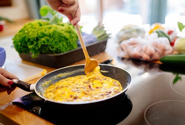 To avoid overcooked scrambled eggs, turn the burner off and use the residual heat to finish the cooking process while the eggs are still a little runny. To avoid overcooked scrambled eggs, turn the burner off and use the residual heat to finish the cooking process while the eggs are still a little runny.