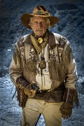 The thief backed off when the cowboy revealed his six shooter. The thief backed off when the cowboy revealed his six shooter.