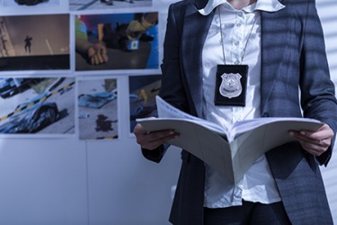 The detective wanted to revisit the evidence in the open case because she wondered if she might have missed something. The detective wanted to revisit the evidence in the open case because she wondered if she might have missed something.