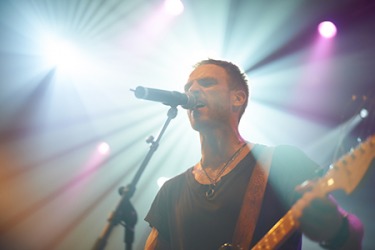 The musician was in a state of rhapsody while singing the song he wrote for his young son. The musician was in a state of rhapsody while singing the song he wrote for his young son.