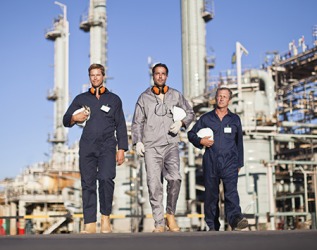The riggers work together at the offshore oil refinery for several months at a time. The riggers work together at the offshore oil refinery for several months at a time.