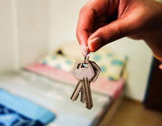 A neighbor advertised for a roomer because she had an empty spare room in her house and she live close to the college. A neighbor advertised for a roomer because she had an empty spare room in her house and she live close to the college.