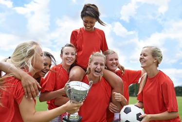 After winning the rubber game at the soccer tournament, the team celebrated their hard fought victory. After winning the rubber game at the soccer tournament, the team celebrated their hard fought victory.