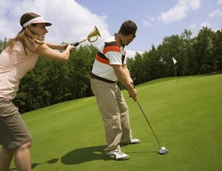 Leanne attempted to sabotage her husband while he was putting the ball. Leanne attempted to sabotage her husband while he was putting the ball.