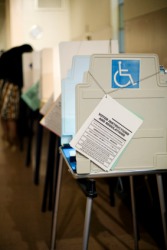 A row of voting booths. A row of voting booths.