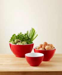 Three bright red bowls. Three bright red bowls.