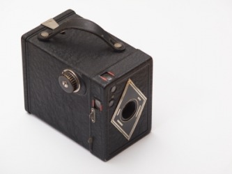 A vintage box camera. A vintage box camera.