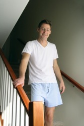 A man wearing boxer shorts. A man wearing boxer shorts.