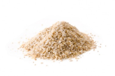A small pile of oat bran. A small pile of oat bran.