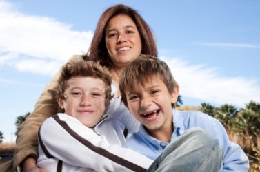 Two brothers with their mother. Two brothers with their mother.