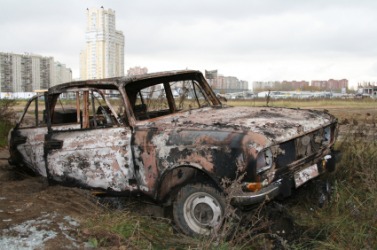 An old burnt car. An old burnt car.