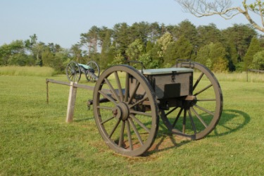 An old artillery caisson on display at a national park.