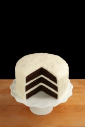 A cake with a large slice missing. A cake with a large slice missing.