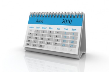 A desktop calendar showing the month of June. A desktop calendar showing the month of June.