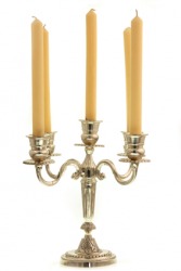A silver candelabrum. A silver candelabrum.