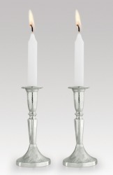 A pair of silver candlesticks. A pair of silver candlesticks.
