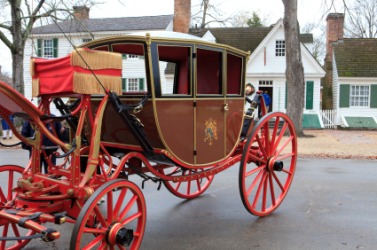 An antique horse-drawn carriage. An antique horse-drawn carriage.