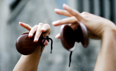 A woman using castanets. A woman using castanets.