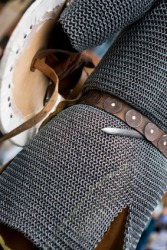 A knight wearing chain mail. A knight wearing chain mail.