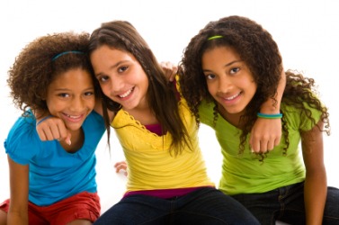 Three charming young girls. Three charming young girls.