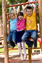 Happy children on a playground. Happy children on a playground.