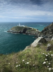 A lighthouse in the Isle of Anglesey. A lighthouse in the Isle of Anglesey.