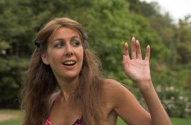 A woman waving A woman waving